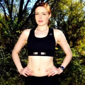 Woman wearing an Adidas / NuMetrex smart sports bra with woven heart-rate sensor electrodes — header image for the smart clothing roundup
